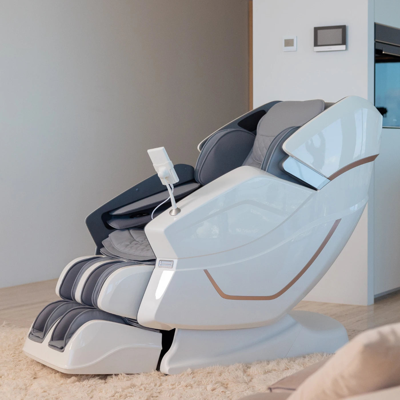 Bliss XO massage chair in glossy white with grey cushions, featuring 4D rollers and memory settings.