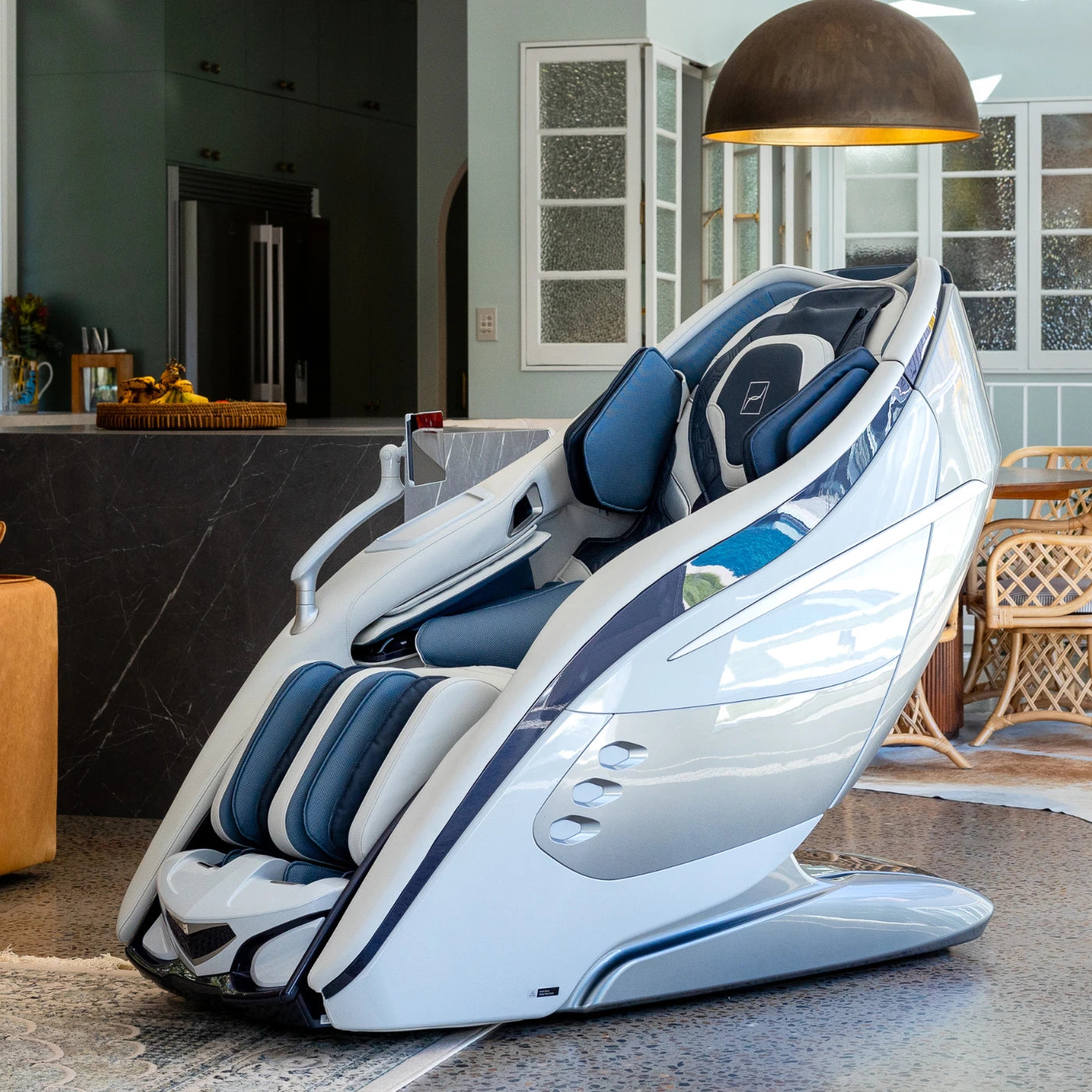DaVinci massage chair in navy blue and white, featuring a modern design with sculpted armrests.