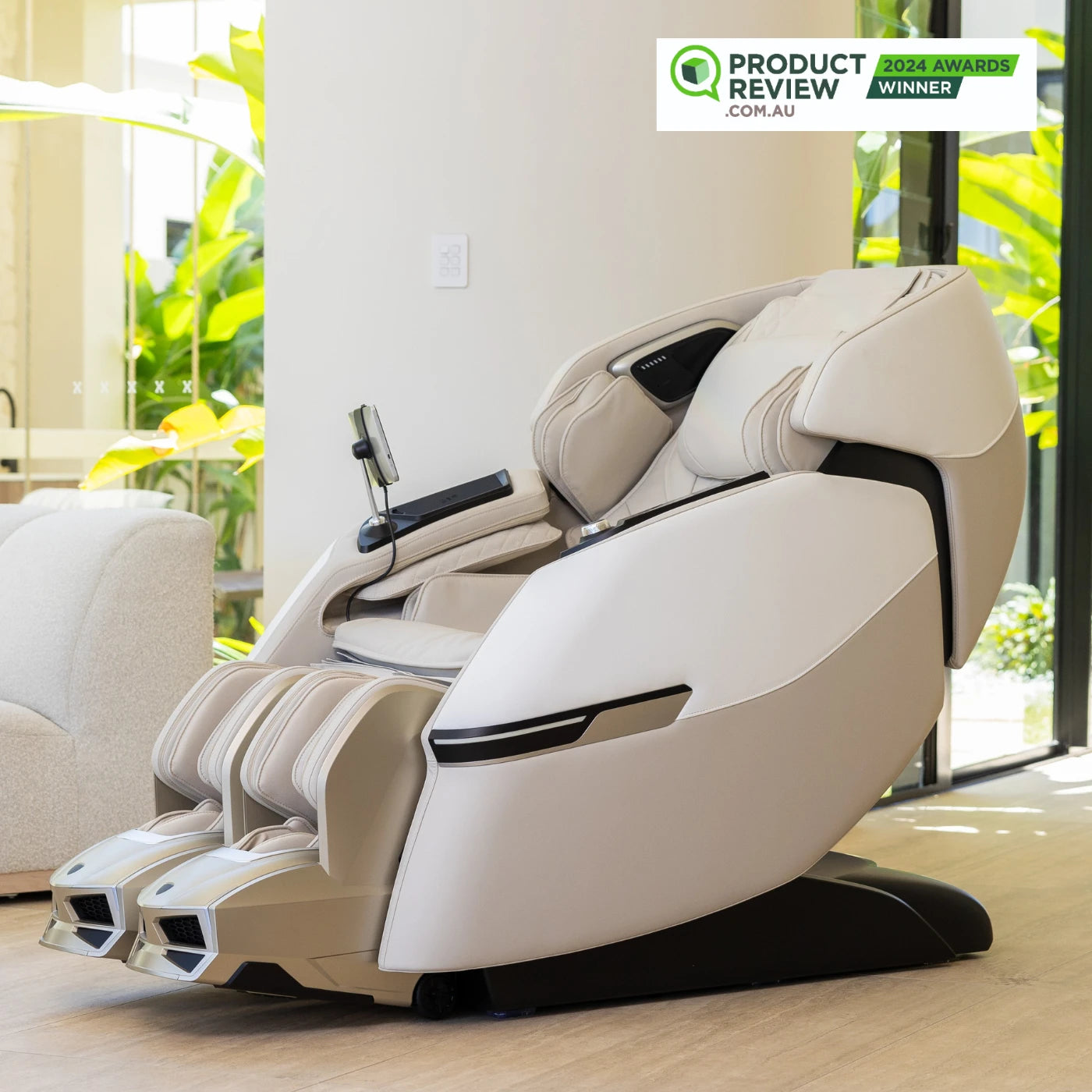 Zeus Athletica massage chair in rich tan leather with gold accents, designed for athletes with SORA leg technology.